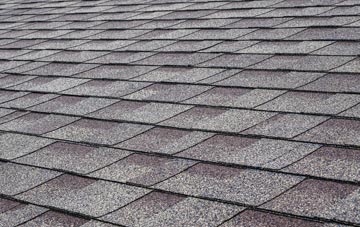 Headwood tiles for shallow pitch roofing